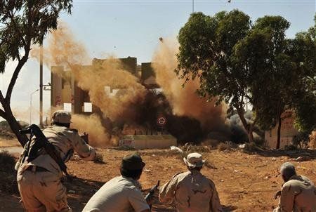 卡扎菲最后一座城市被攻陷 当局武装占领苏尔特大部(组图)