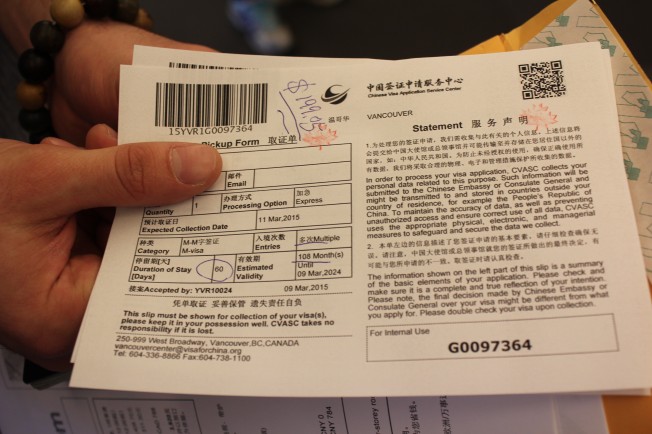 雷切爾獲批九年有效的中國簽證。圖為中國簽證服務中心的取證單。（記者倪怡婧／攝影）  