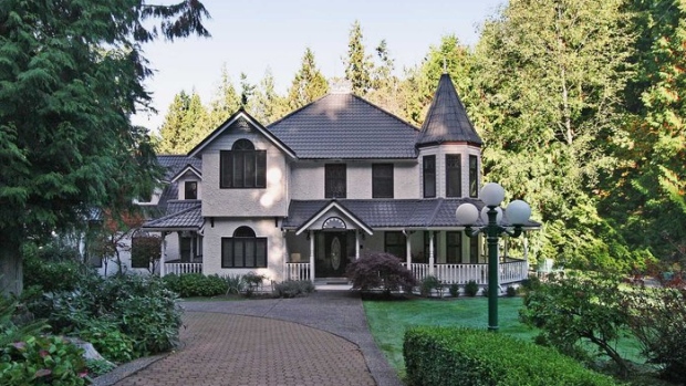 This $3.5 million home in Surrey B.C. is one of four Lower Mainland homes a Chinese bank claims are owned by a fugitive who defaulted on a $10 million loan.