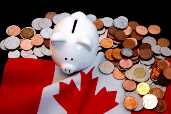 Canadian-money-Piggy-Bank-Can-Stock.jpg